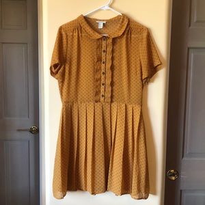 Yellow flowy dress with white polka dots